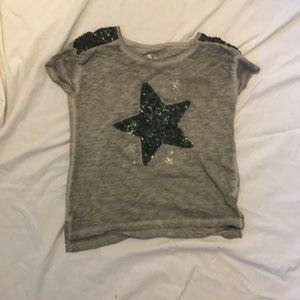 An army green glittery top